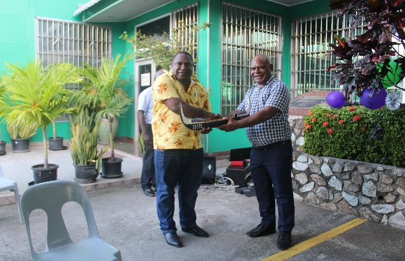 Mr. Wemin Boi presenting award